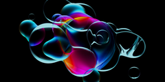 Bulles translucides et colorées flottant sur un fond noir, avec des teintes vives de bleu, violet, rose et orange